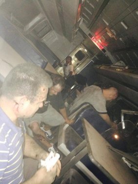 Passengers inside the derailed Amtrak train in a photo provided by former Pennsylvania Congressman Patrick Murphy, who was a passenger on the train. 