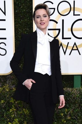 Evan Rachel Wood arrives in a suit at the 74th annual Golden Globe Awards.