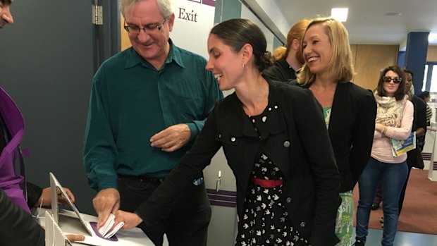 Andrew Bartlett, the Greens' Brisbane candidate Kirsten Lovejoy and Senator Larissa Waters voting at Brisbane Central State School.