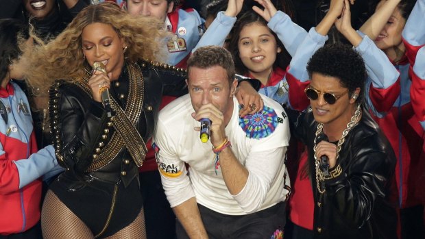 A high-powered delegation from NSW saw Beyonce, Coldplay singer Chris Martin and Bruno Mars perform at the Super Bowl before jetting off to Las Vegas and London.