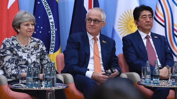 Malcolm Turnbull with Britain's Prime Minister Theresa May and Japan's Prime Minister Shinzo Abe at the G20 Summit in Hamburg.