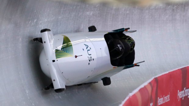 Lucas Mata, David Mari, Lachlan Reidy and Hayden Smith take a curve during training for the four-man bobsled competition in PyeongChang.