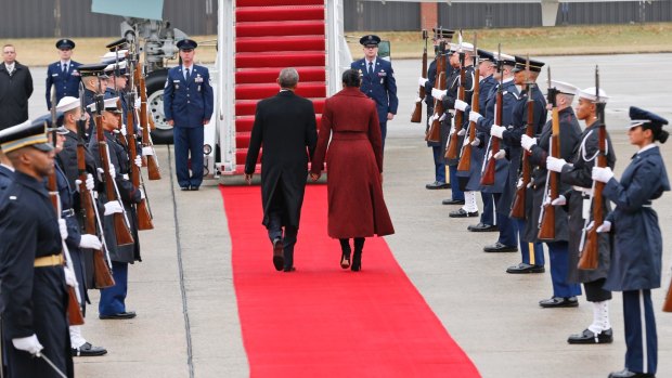 Former President Barack Obama and his wife Michelle leave Washington.