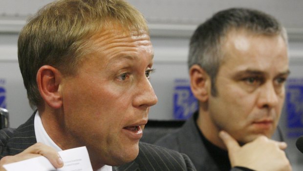 Andrei Lugovoi, left, a former KGB officer, and his associate Dmitry Kovtun attend a news conference in Moscow.