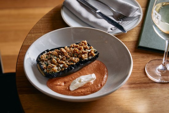 Tino's vegan-friendly dish of charred eggplant, savoury granola and house-made sunflower yoghurt.