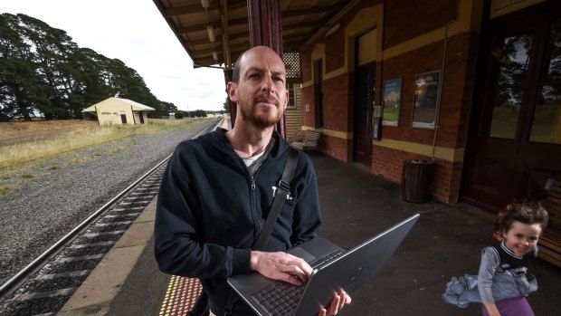 Wayne Bell commutes from Ballan to Melbourne each day for work. His is unable to connect to the internet all the way due to black spots in the signal.