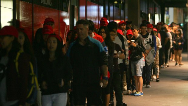 Crowds build outside David Jones City store, Sydney, in the early hours of the morning. 