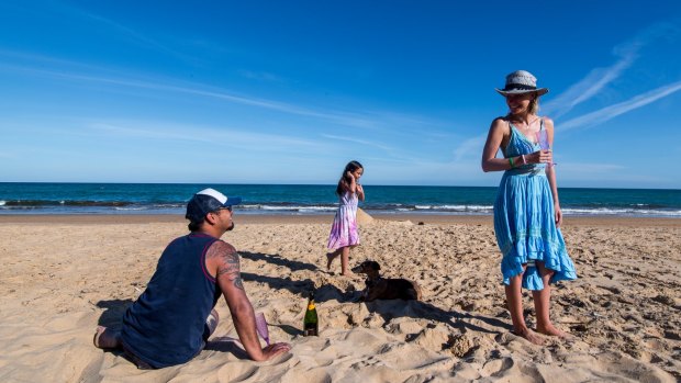 Will, Yvonne and Lydian Borland enjoy the beach pleasures.