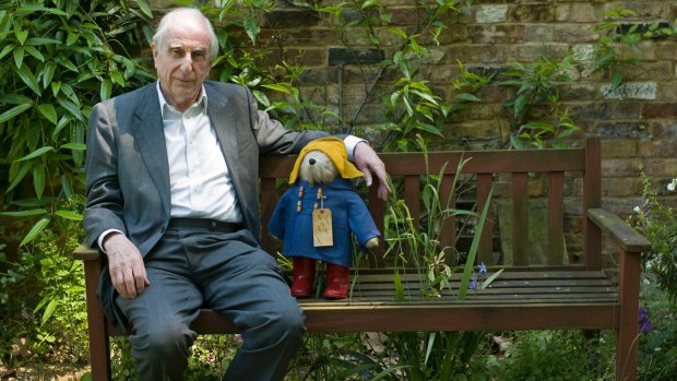 Michael Bond, pictured in 2005 with a Paddington Bear toy.