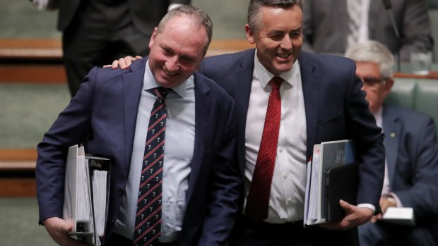 Happier times: Barnaby Joyce and Darren Chester in October.