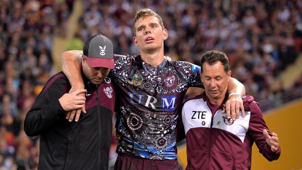 Concerning sight: Tom Trbojevic is taken from the field injured against Brisbane.