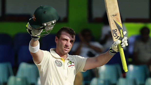 Proud moment: Phillip Hughes celebrates his third Test century against Sri Lanka in Colombo in 2011.