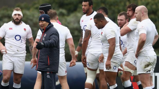 Carrot and stick: Eddie Jones looks on during an England training session at Pennyhill Park.