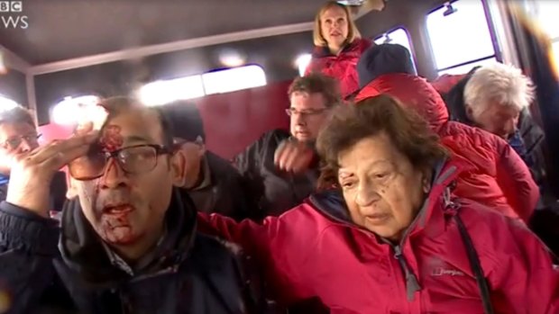 Tourists and a BBC crew escape the volcanic blast on Mount Etna.