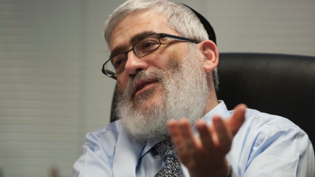 Joe Gutnick says he will fight a $55.5 million law suit brought by an Indian fertiliser collective.