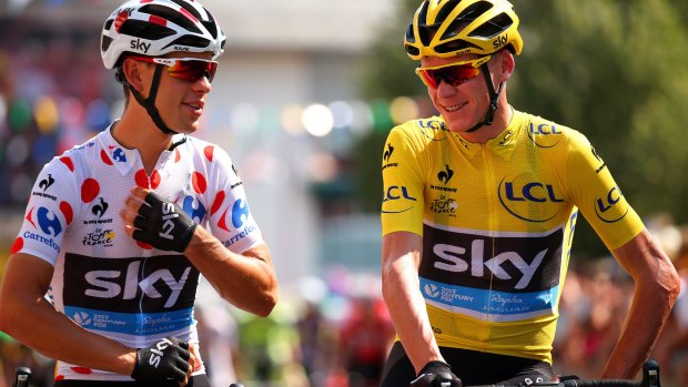 Chris Froome (R) with Richie Porte before for the start of stage 12.