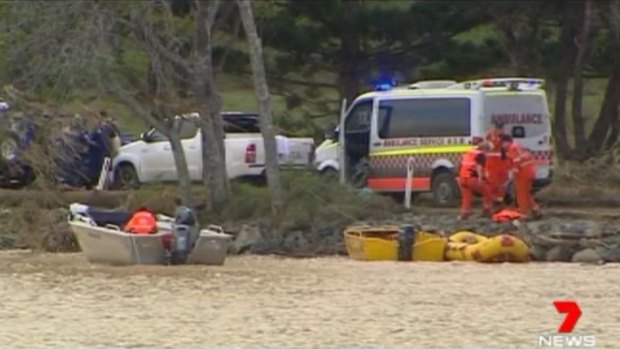 Emergency services at the Tweed River in Tumbulgum on Monday afternoon.