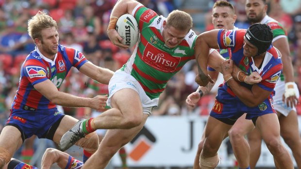 Raw power: George Burgess does the grunt work up the middle.