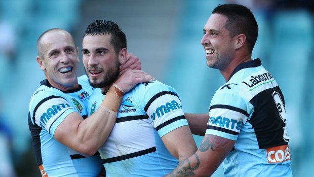Drought-breakers: Jeff Robson, Jack Bird and Gerard Beale celebrate after Beale's try at Allianz Stadium.