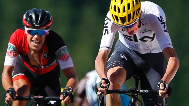 Hanging tough: Richie Porte sticks like glue to new race leader Chris Froome.