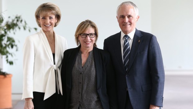 Senator Michaelia Cash with Rosie Batty and Communications Minister Malcolm Turnbull at Parliament House in Canberra after a press conference on violence against women on Monday.