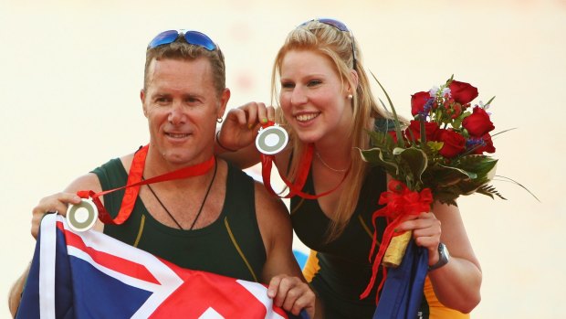 John Maclean and Kathryn Ross after winning silver in the rowing mixed double sculls at the 2008 Paralympic Games in Beijing.