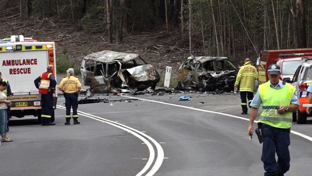 Emergency services at the crash site on the Princes Highway at Mondayong, about 400 metres north of the Bendalong turn-off.

