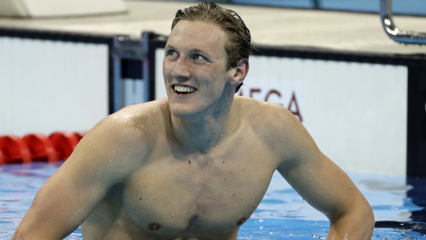 Winner: Australia's Mack Horton smiles after taking out gold in the final of the men's 400m freestyle.