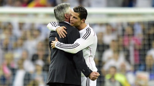 Tough year: Real Madrid's outgoing coach Carlo Ancelotti shares a moment with star winger Cristiano Ronaldo.
