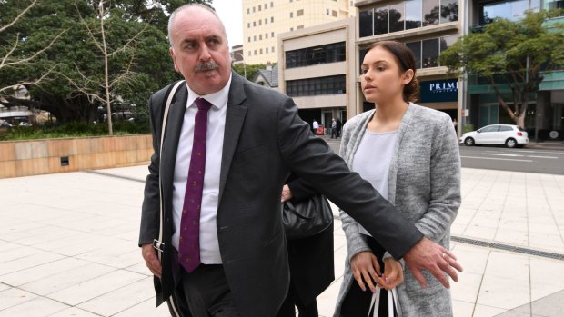 Madeline Sawyer at Parramatta District Court with her lawyers in June.