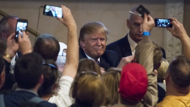 A rampaging success: Donald Trump and fans in Las Vegas.