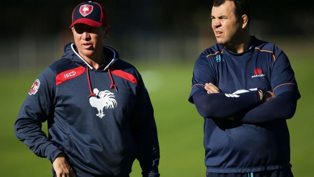 Comparing notes: Trent Robinson and Michael Cheika at a joint training session between the Roosters and Waratahs this year.