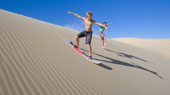 A Port Stephens 4WD sandboarding tour will have you whooping, as you rollercoaster your way out to the dunes – before flying downhill on a sandboard.