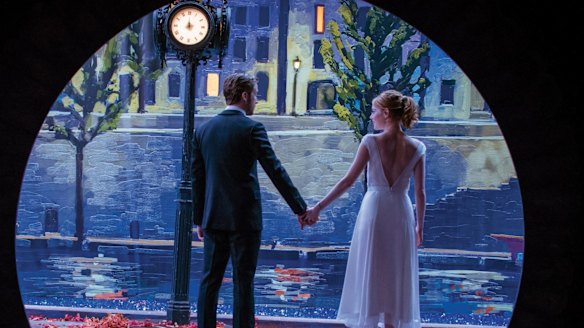 Sebastian (Ryan Gosling) and Mia (Emma Stone) light up the screen in <i>La La Land</i>.