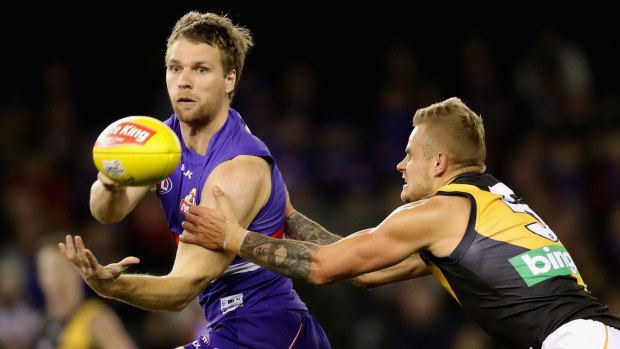 Four second-half goals from Western Bulldogs' livewire Jake Stringer helped seal the win over Richmond.
