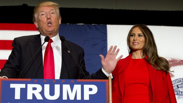 Republican presidential candidate Donald Trump, accompanied by his wife Melania Trump, speaks during a campaign event in Cedar Rapids, Iowa in March.