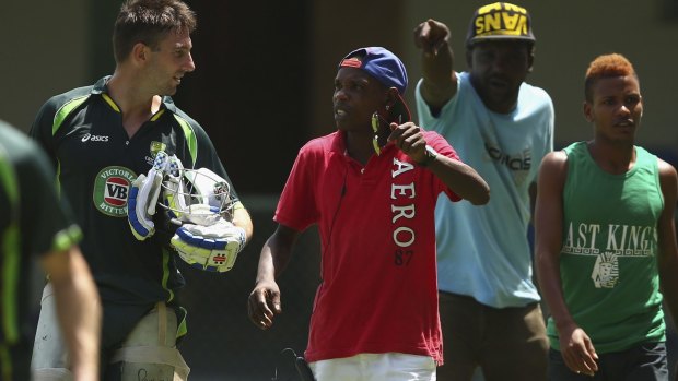 Shaun Marsh of Australia is approached by locals wanting match tickets.