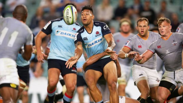 Passing issue: Israel Folau gets the ball away against the Kings – not one of his strengths, according to Alan Jones.