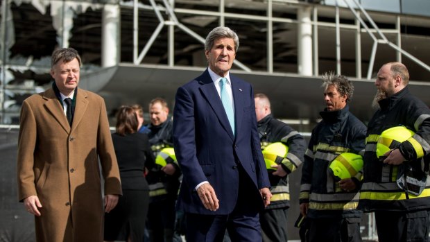 US Secretary of State John Kerry arrives in Brussels.