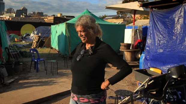  'Aunty Jenny' walks through the  Redfern Tent Embassy