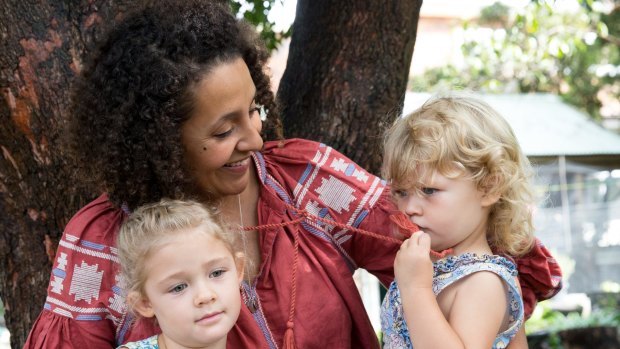 Kirsty Rutherford with her daughters, Olive, 4, and Mabel, 2, who attend the Clovelly Child Care Centre.
