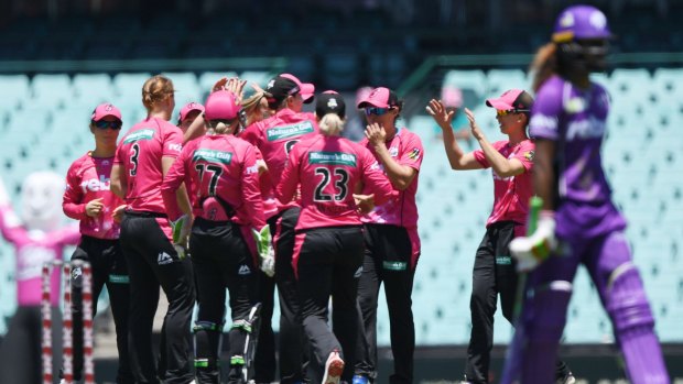 Back tot eh pavilion: The Sixers celebrates the run out of Hayley Matthews of the Hurricanes at the SCG.