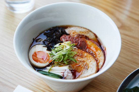 The polished ramen based on a bright chicken consomme.