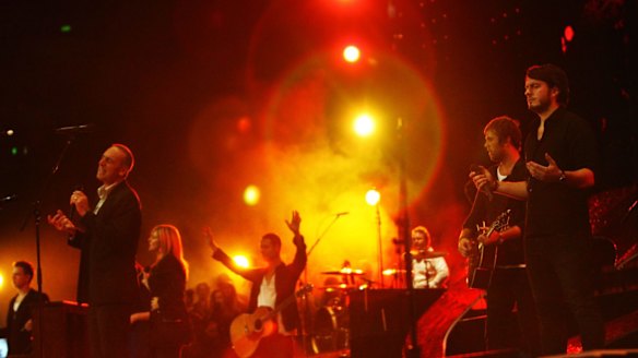 Brian Houston (left) leads the Hillsong entourage at the church's annual conference in Sydney.