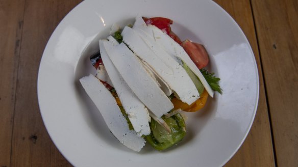 Tomato and nectarine salad with house-smoked ricotta salata.