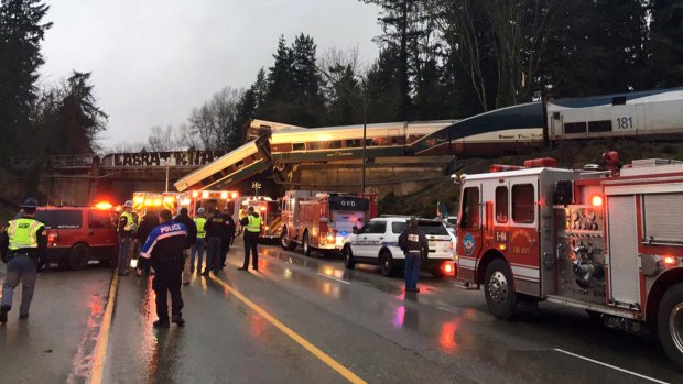 Emergency services at the scene after an Amtrak train derailed south of Seattle.