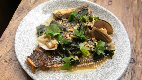Whole flounder, diamond clams, bonito butter and wakame, one of Sushil Aryal's new dishes at Tokyo Tina.