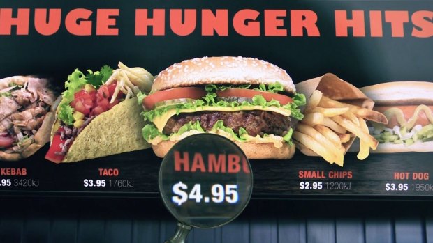 Better fast food labelling is urgently needed, according to Cancer Council Victoria. Pictured is a mocked up version of a menu board that makes the point.