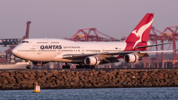 A Qantas Boeing 747-400 landing on the runway at Sydney's Kingsford Smith Airport in September.