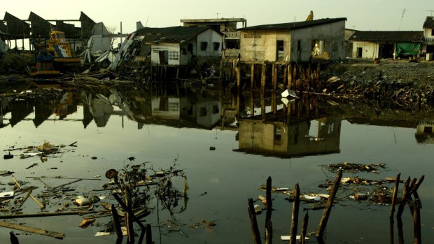 The Boxing Day tsunami hit 14 countries and affected 5 million people: Nam Khem village in Thailand.